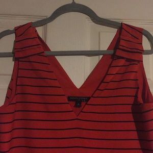 Sleeveless red blouse